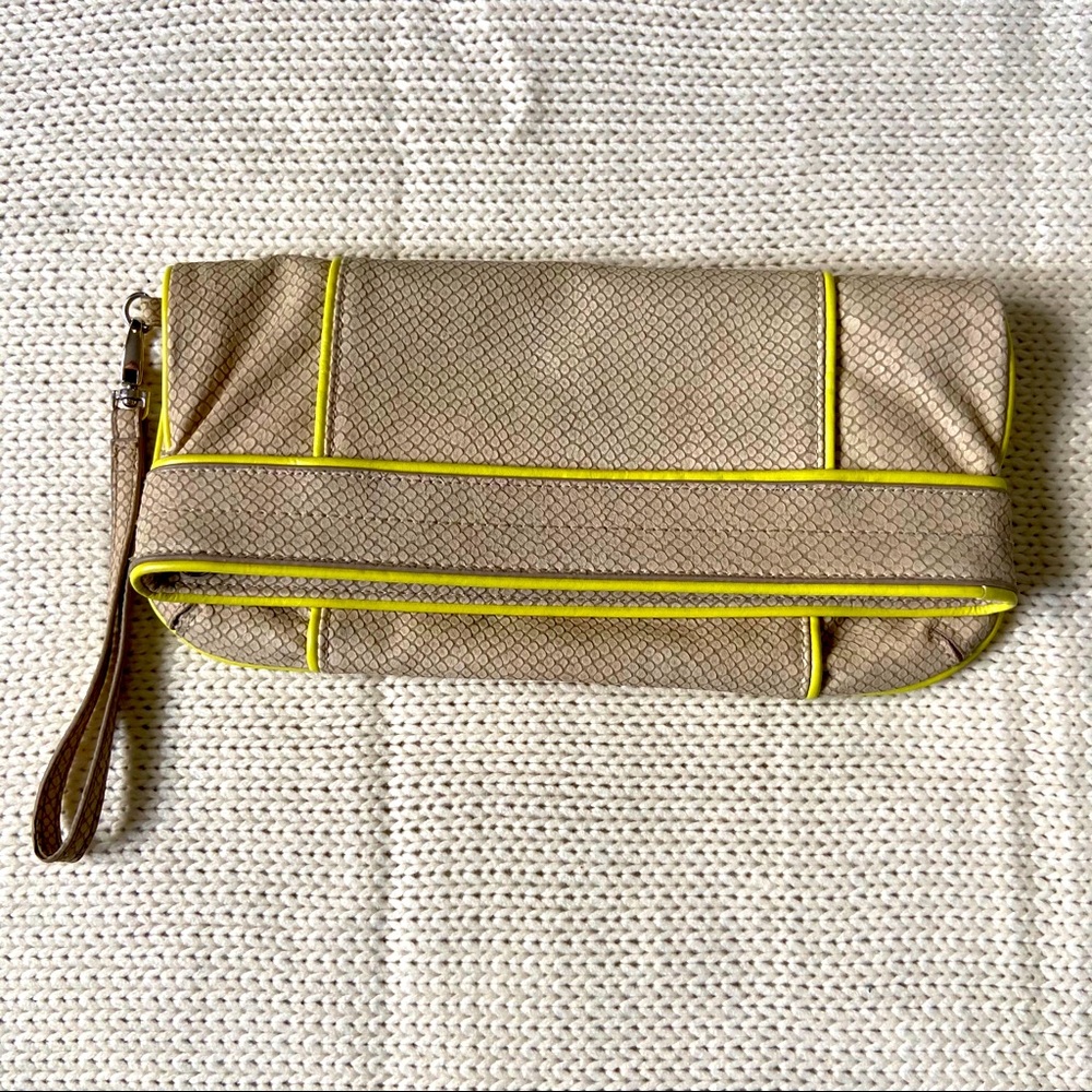 Cream clutch with yellow accents